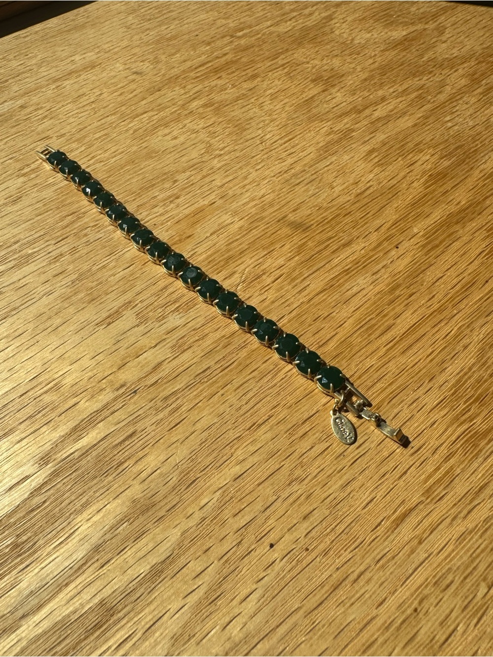 Classic Gold-Plated Bracelet with Dark Green Stones